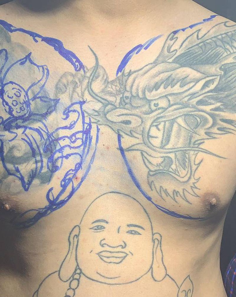 荷花遮盖「未完」纹身图片_胸部新传统纹身图案