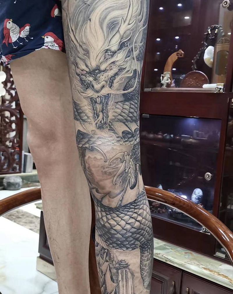 机械臂纹身图片_手臂纹身图案