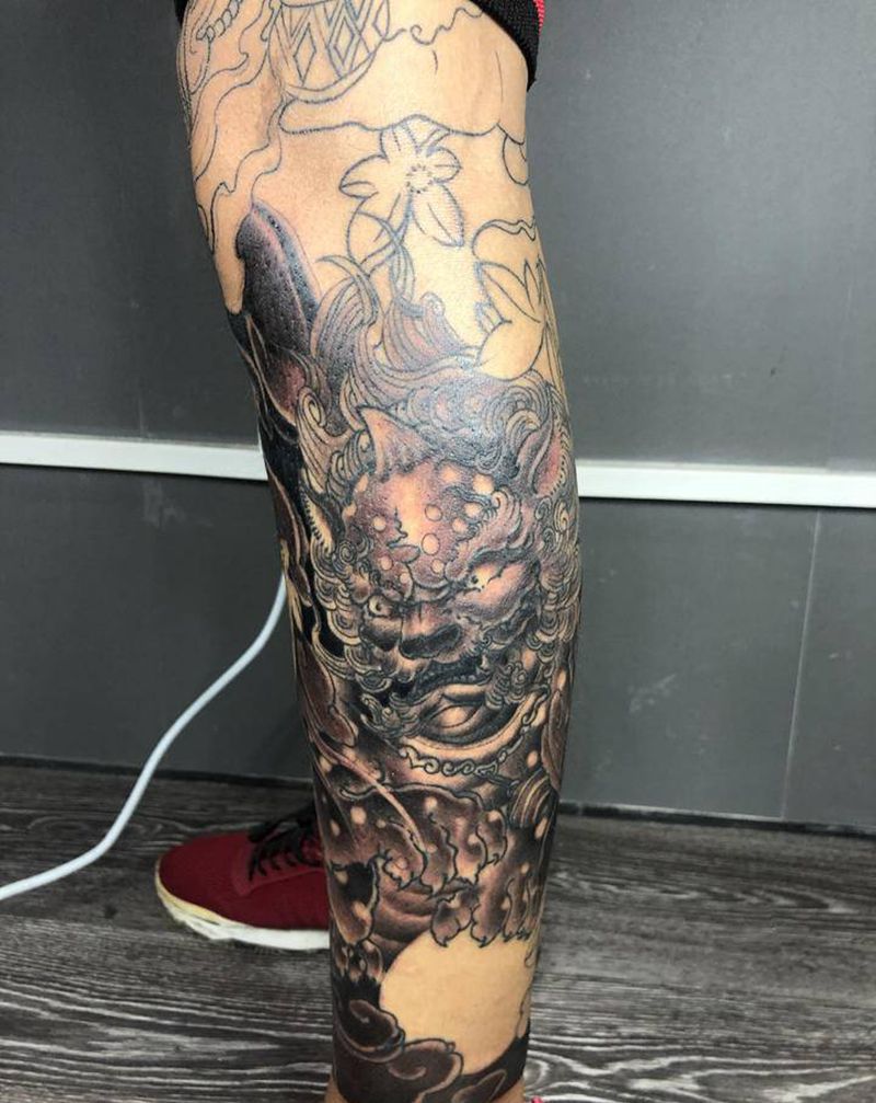 唐狮纹身图片_腿部新传统纹身图案