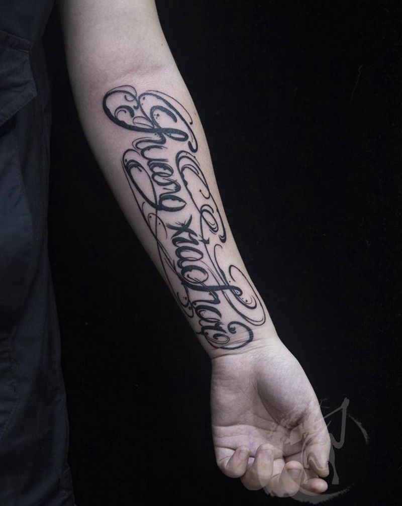 花体字母纹身图片_手臂花体字纹身图案