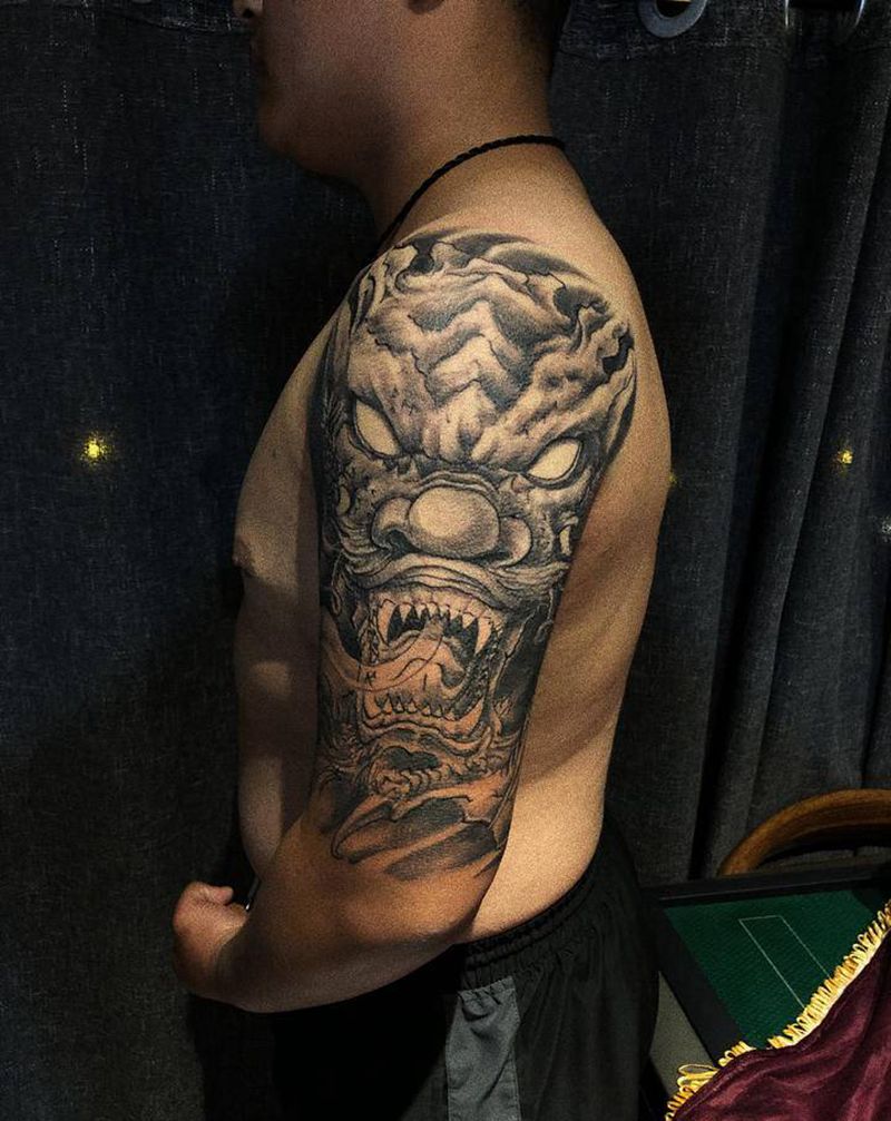 大臂龙头纹身图片_手臂新传统纹身图案