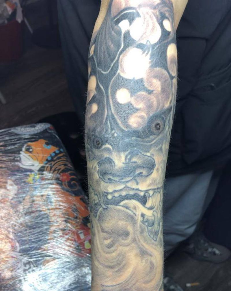 唐狮子纹身图片_手臂新传统纹身图案