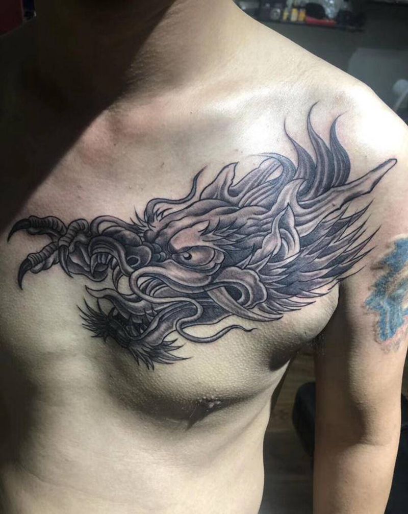 龙头纹身图片_胸部新传统龙头纹身图案