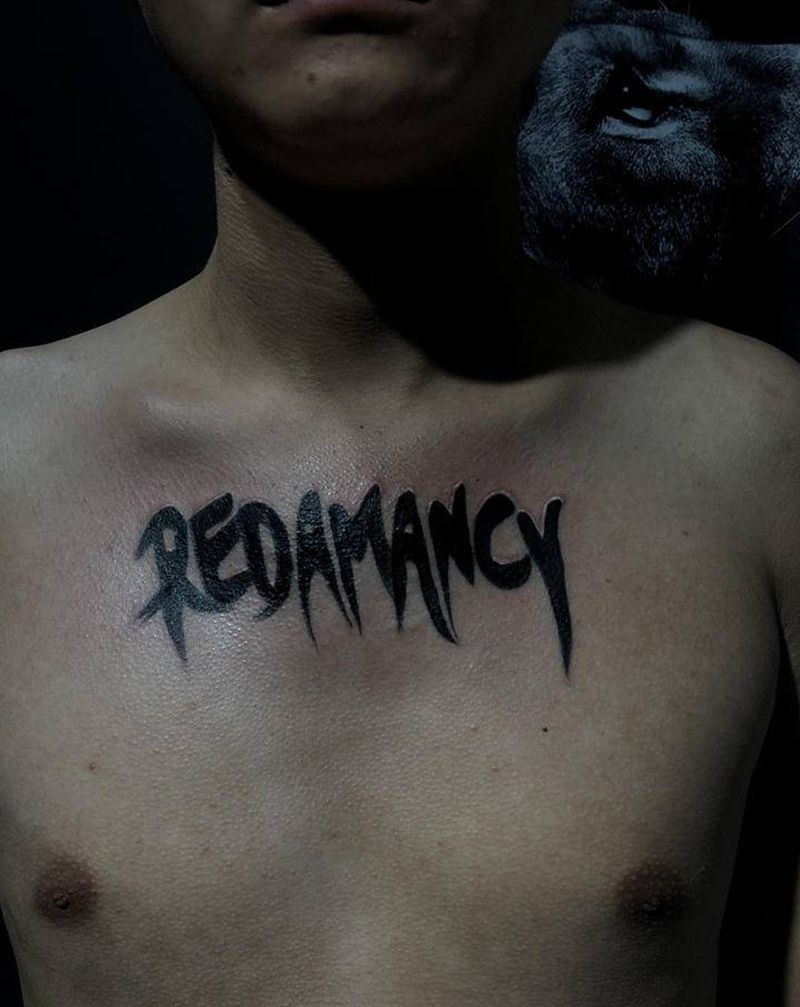 字母纹身图片_胸部花体字纹身图案