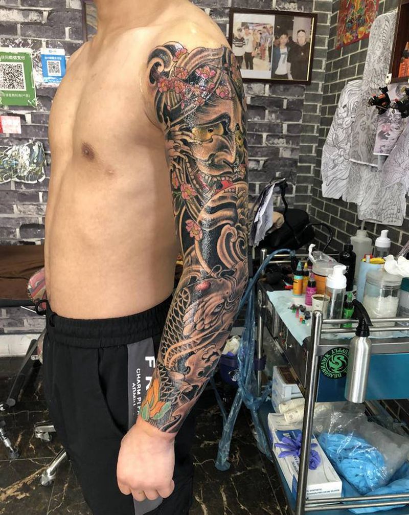 花臂纹身图片_手臂新传统纹身图案