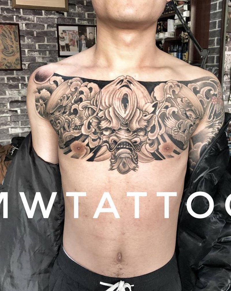 唐狮花胸纹身图片_胸部新传统纹身图案