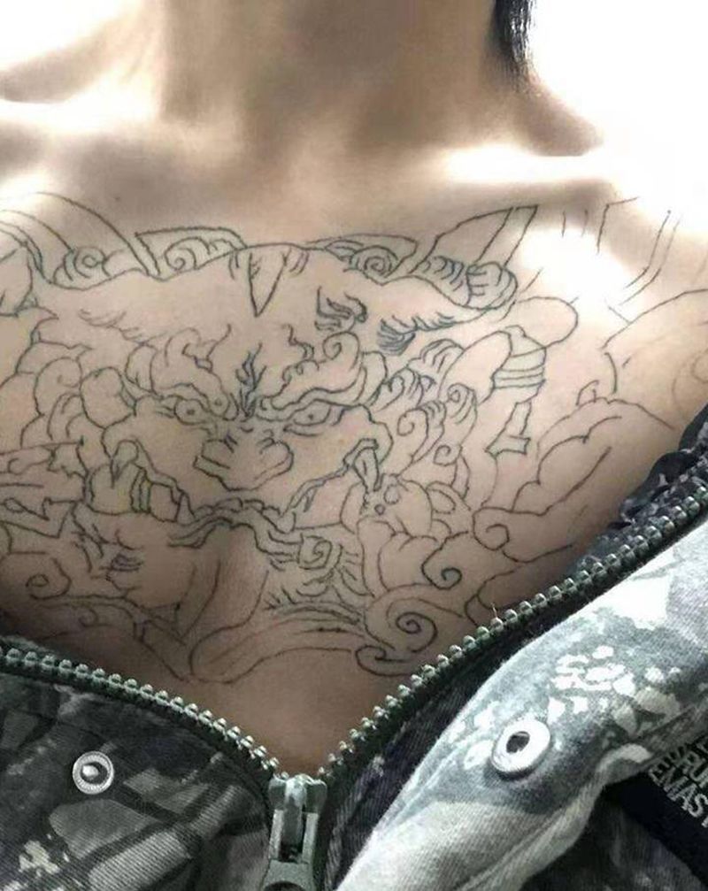 唐狮纹身图片_胸部新传统纹身图案