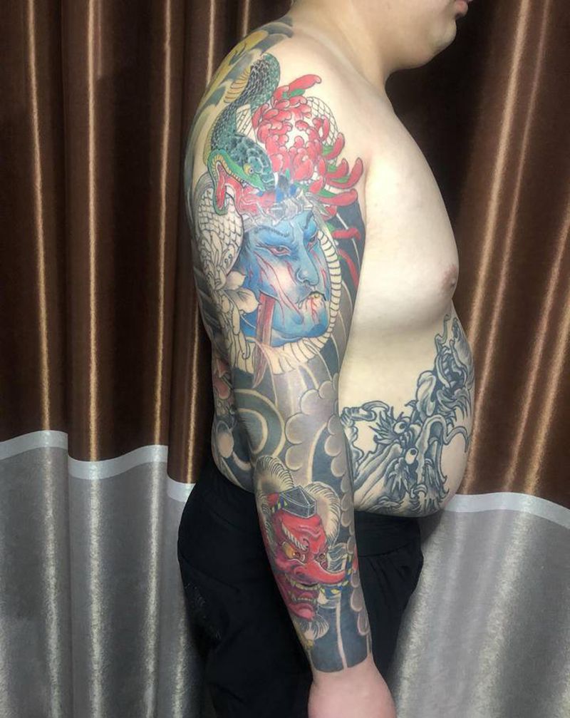 花臂未完成纹身图片_手臂老传统纹身图案