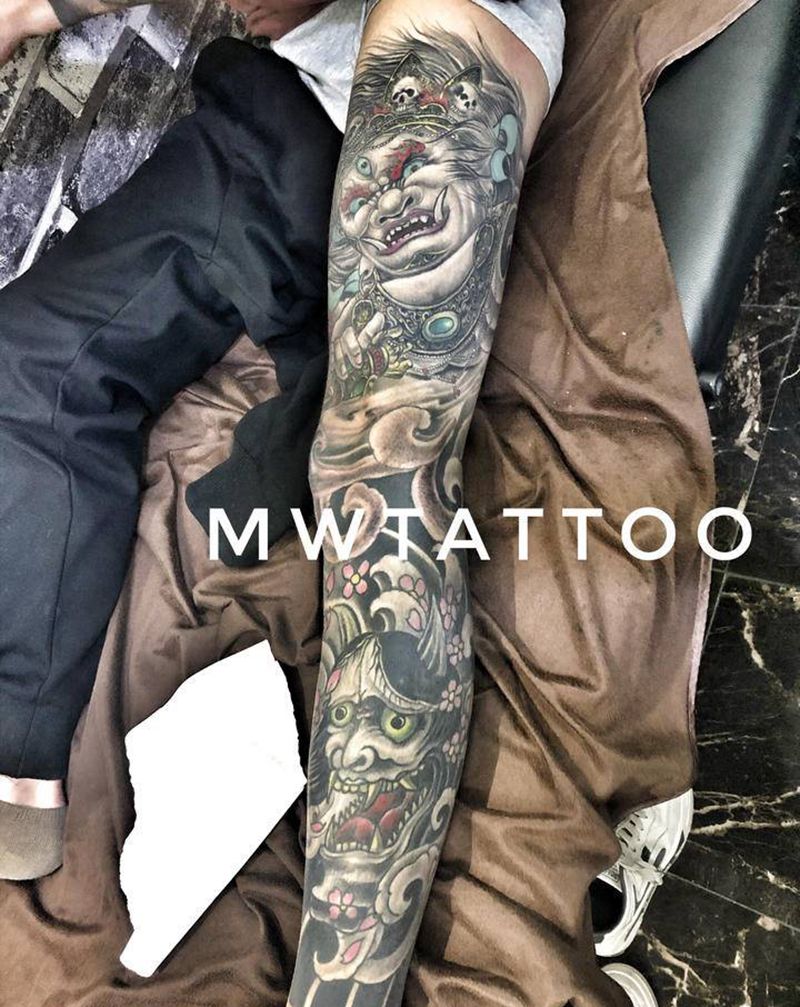 大黑天纹身图片_腿部新传统纹身图案