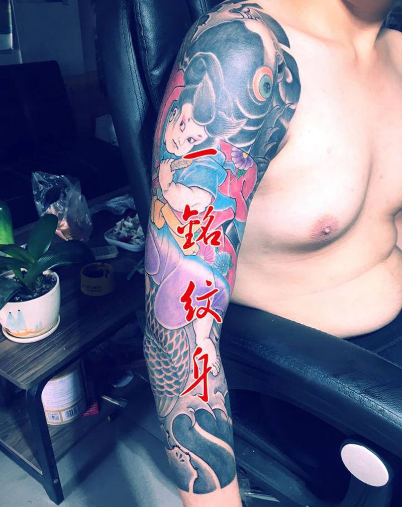 太郎杀鱼精纹身图片_手臂老传统纹身图案