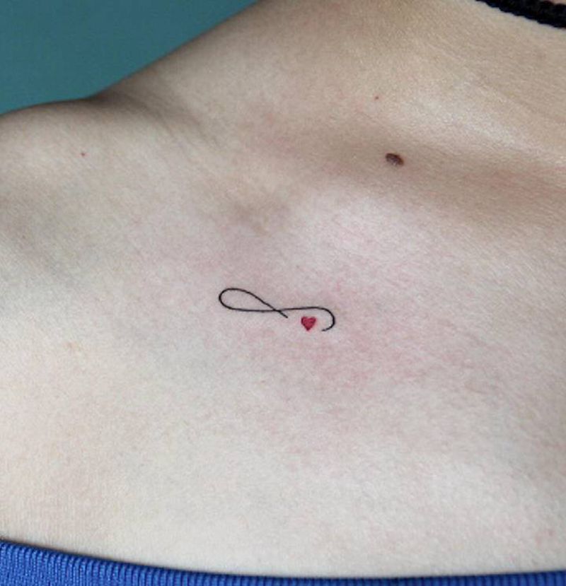 被爱包裹着的无限极纹身图片_手臂几何纹身图案