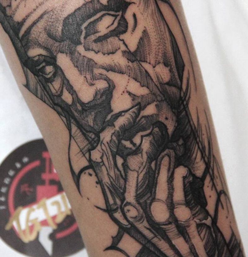 沉默的面具纹身图片_手臂几何纹身图案