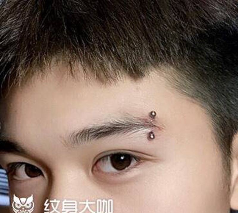 眉钉纹身图片_郑州穿孔纹身图案