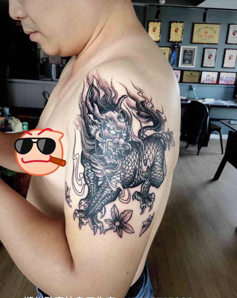 麒麟纹身图片_手臂老传统纹身图案