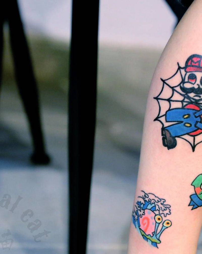 卡通纹身图片_腿部纹身图案