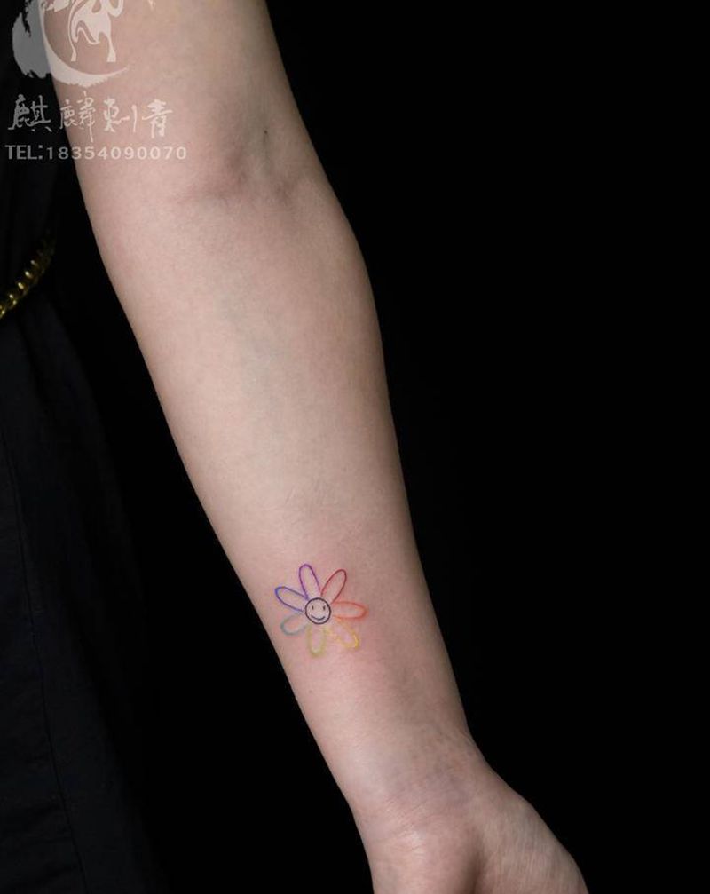 太阳花啊纹身图片_手臂纹身图案