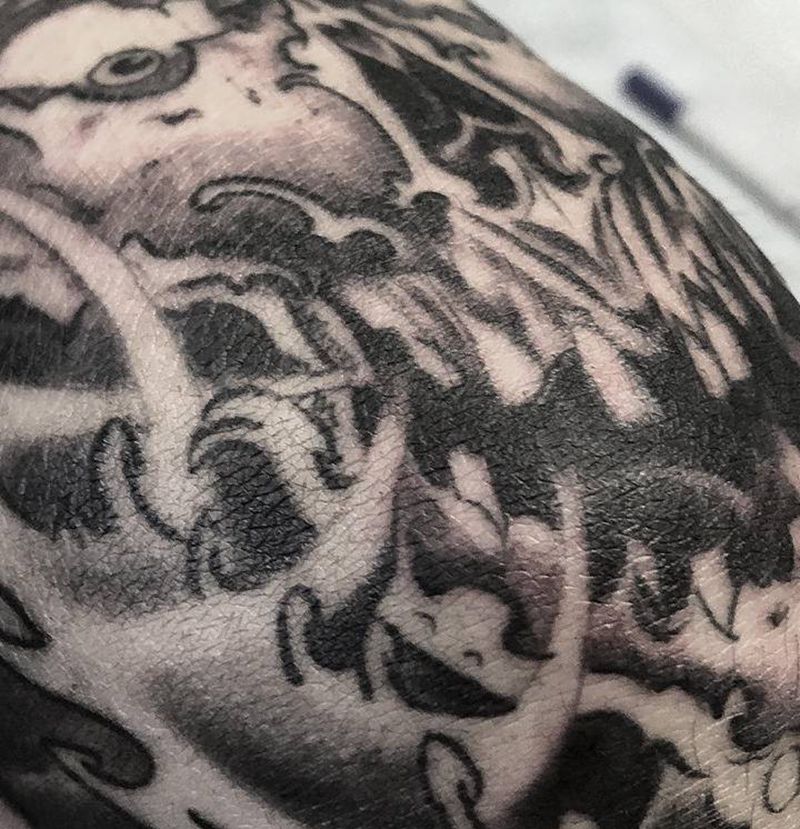 传统包膝盖细节纹身图片_腿部新传统纹身图案