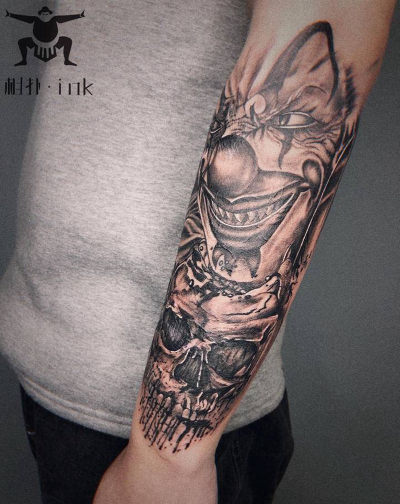 疤痕遮盖小丑和骷髅纹身图片_手臂欧美写实纹身图案