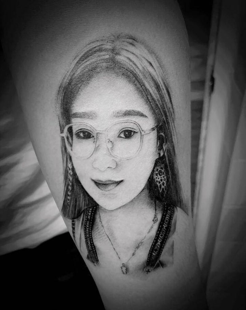 肖像纹身图片_手臂写实纹身图案