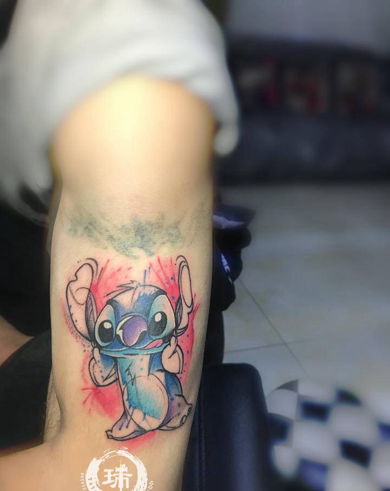 史迪仔纹身纹身图片_手臂水墨新传统卡通纹身图案