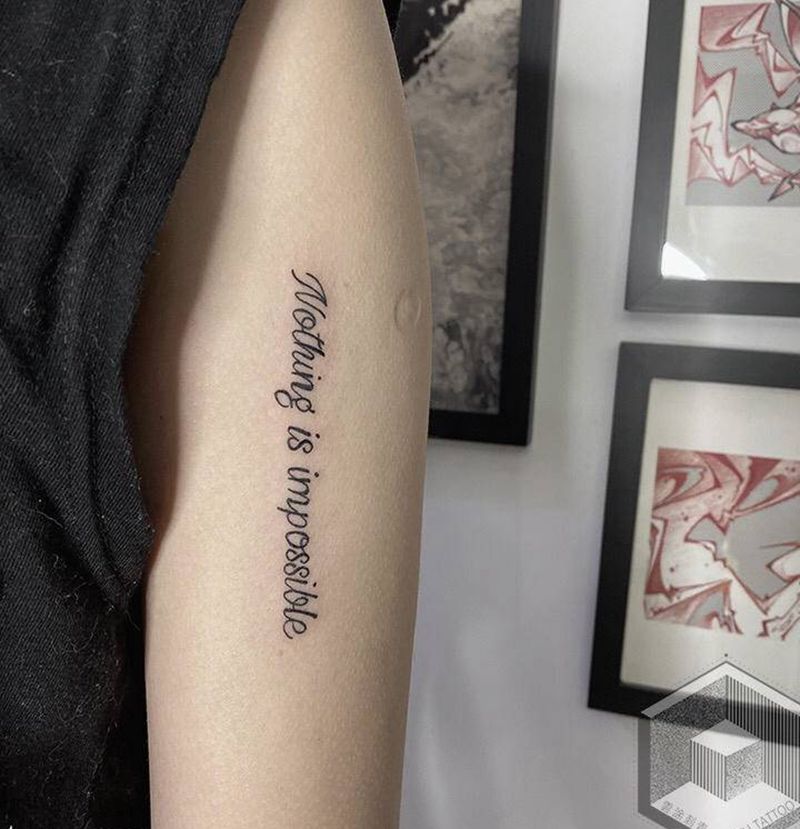 字母纹身图片_手臂花体字纹身图案