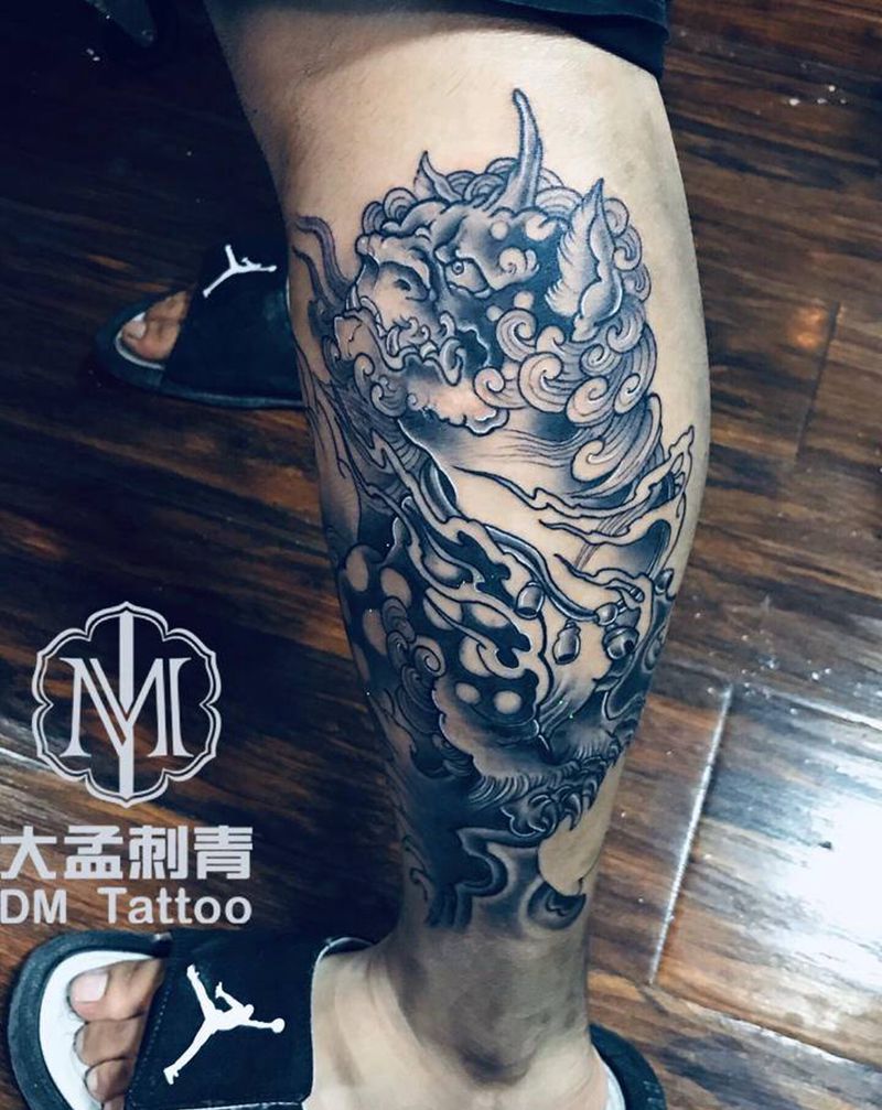 唐狮纹身图片_腿部新传统纹身图案