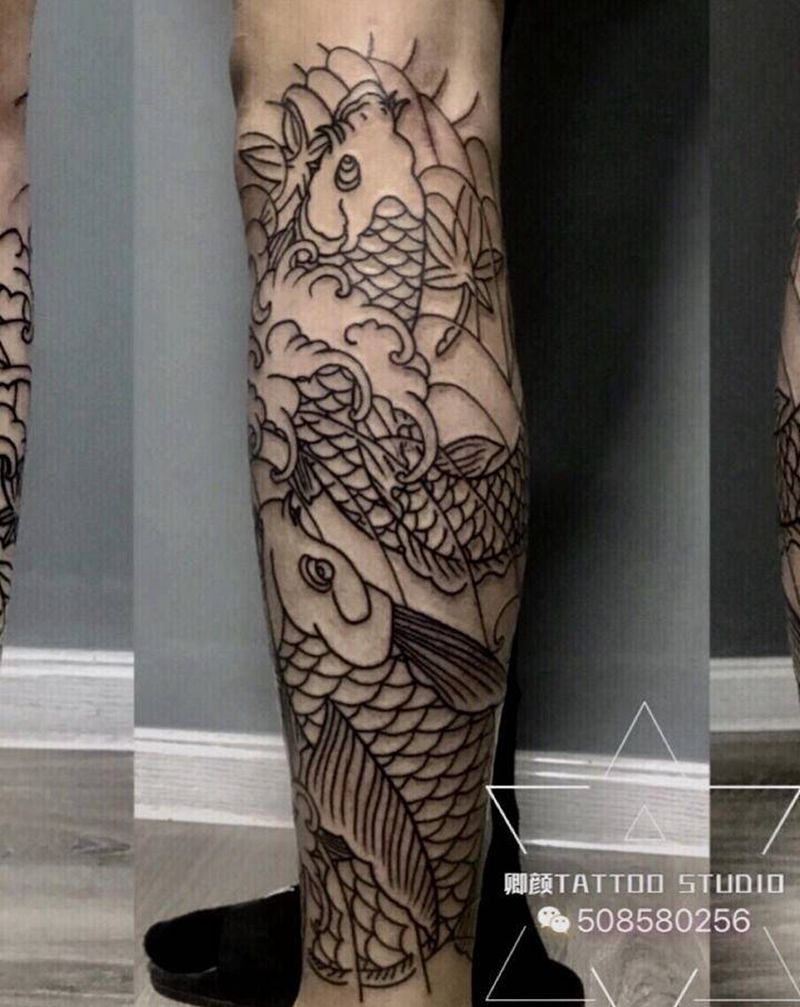 双鱼盘腿财如洪水纹身图片_腿部老传统纹身图案
