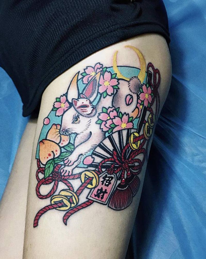 日系扇子兔纹身图片_腿部臀部老传统纹身图案