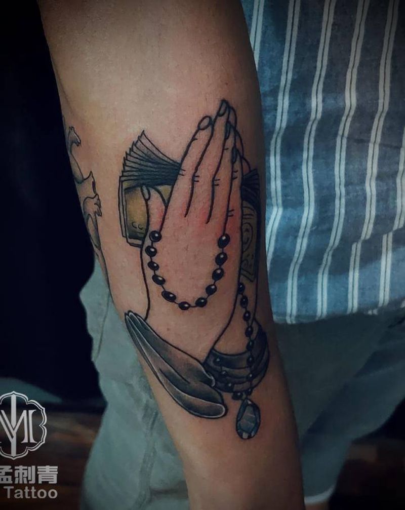 祈祷之手纹身图片_手臂Old School纹身图案
