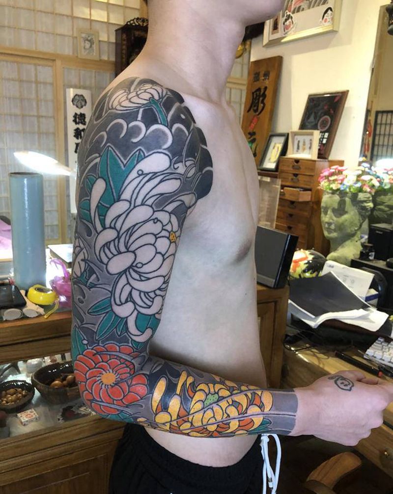 未完纹身图片_手臂老传统纹身图案