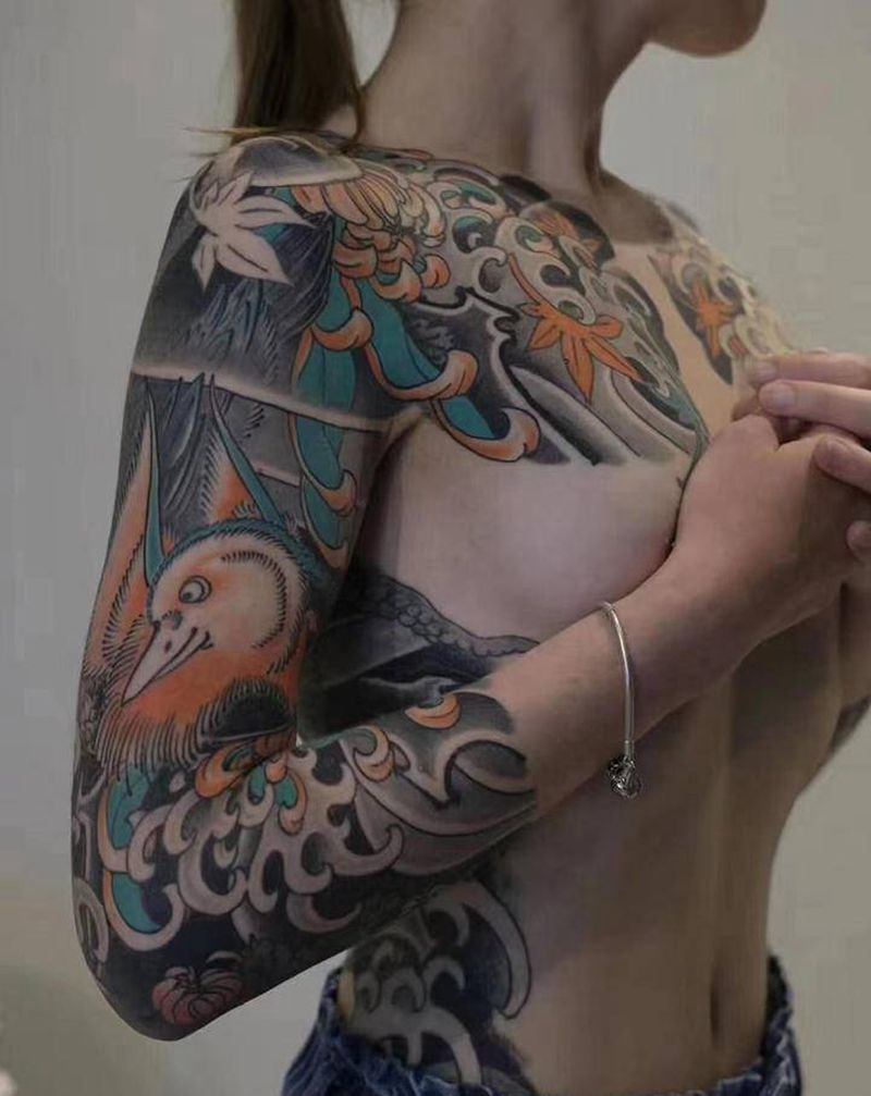 浪里花鸟纹身图片_手臂老传统纹身图案