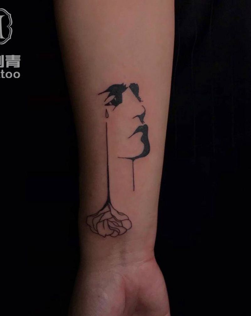 抽象人物纹身图片_手臂几何纹身图案