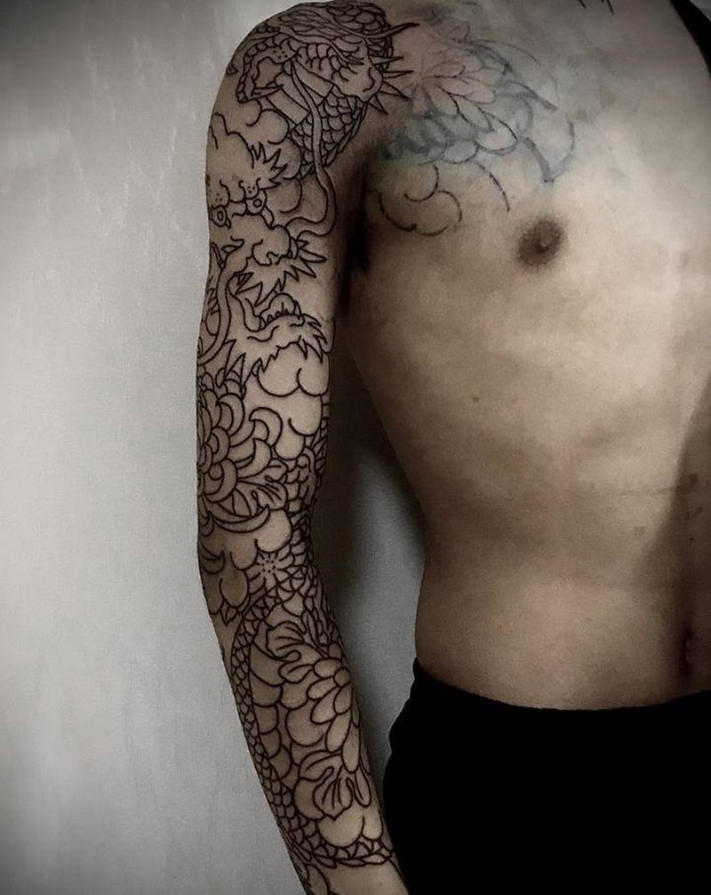 花臂龙线条未完待续纹身图片_手臂老传统纹身图案