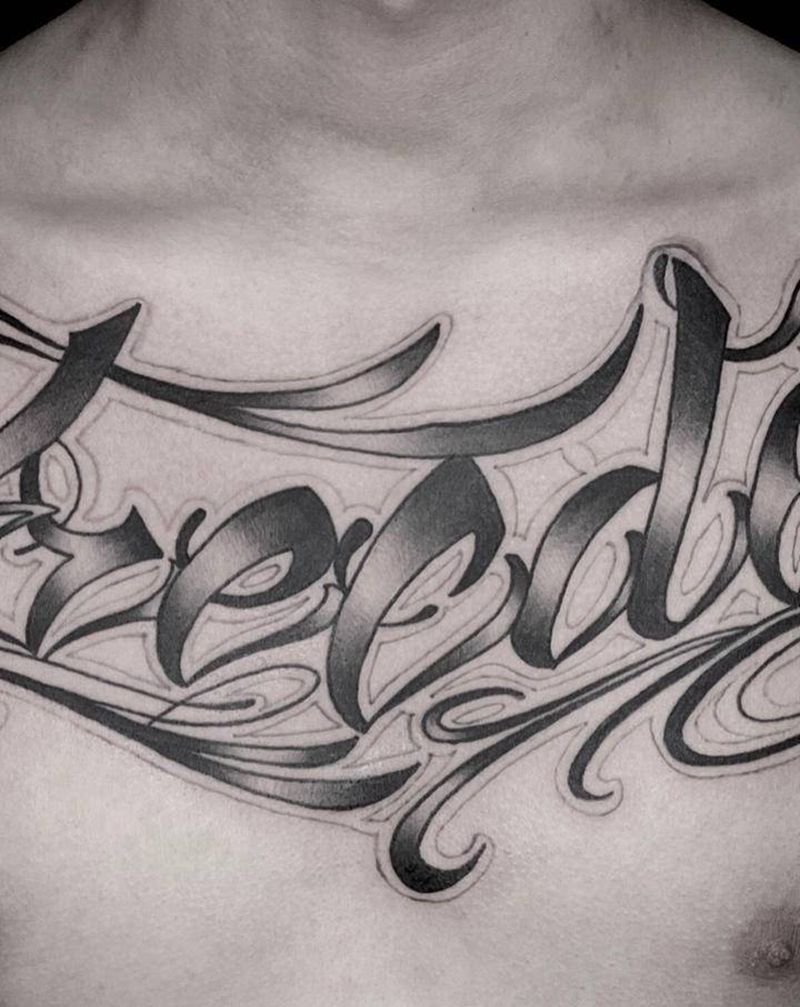 花胸纹身图片_胸部花体字纹身图案
