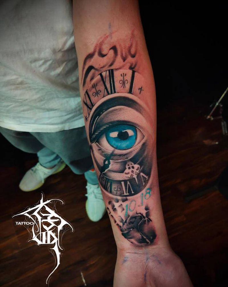 眼睛钟表纹身图片_手臂欧美写实纹身图案