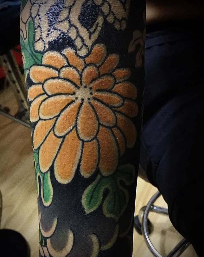 恢复后的花卉纹身图片_手臂老传统纹身图案