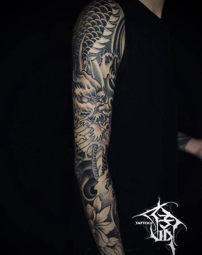 龙花臂纹身图片_手臂新传统纹身图案