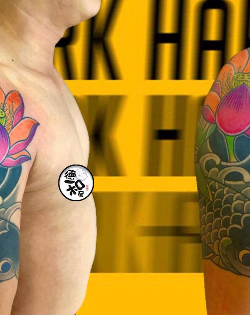 大臂鱼纹身图片_手臂老传统纹身图案