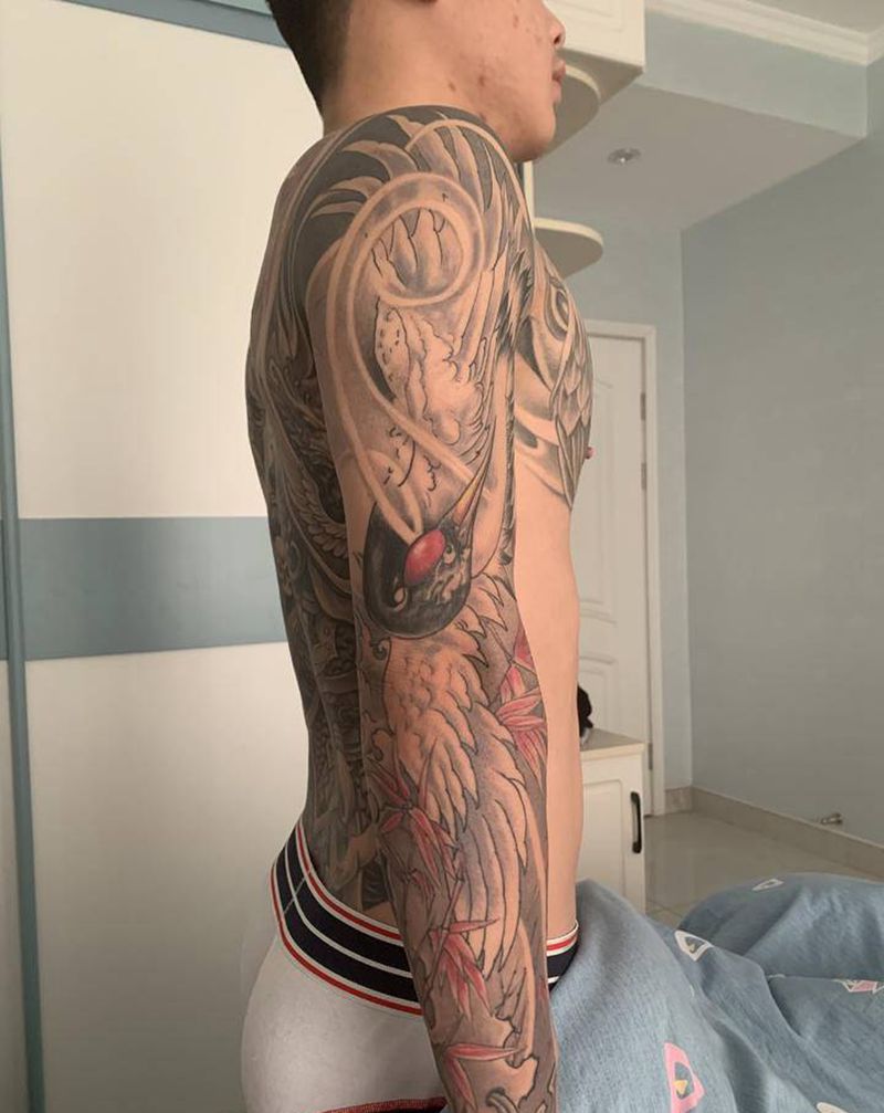 仙鹤花臂纹身图片_手臂新传统纹身图案