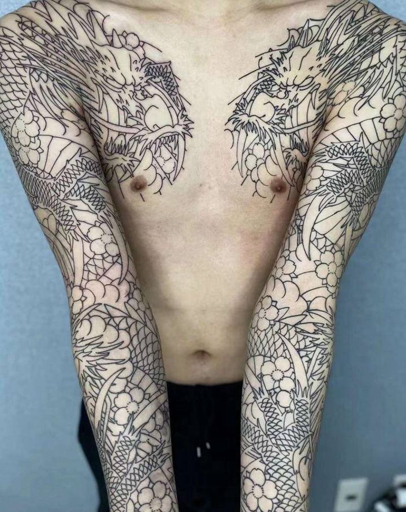 花臂半甲龙纹身图片_手臂胸部老传统纹身图案