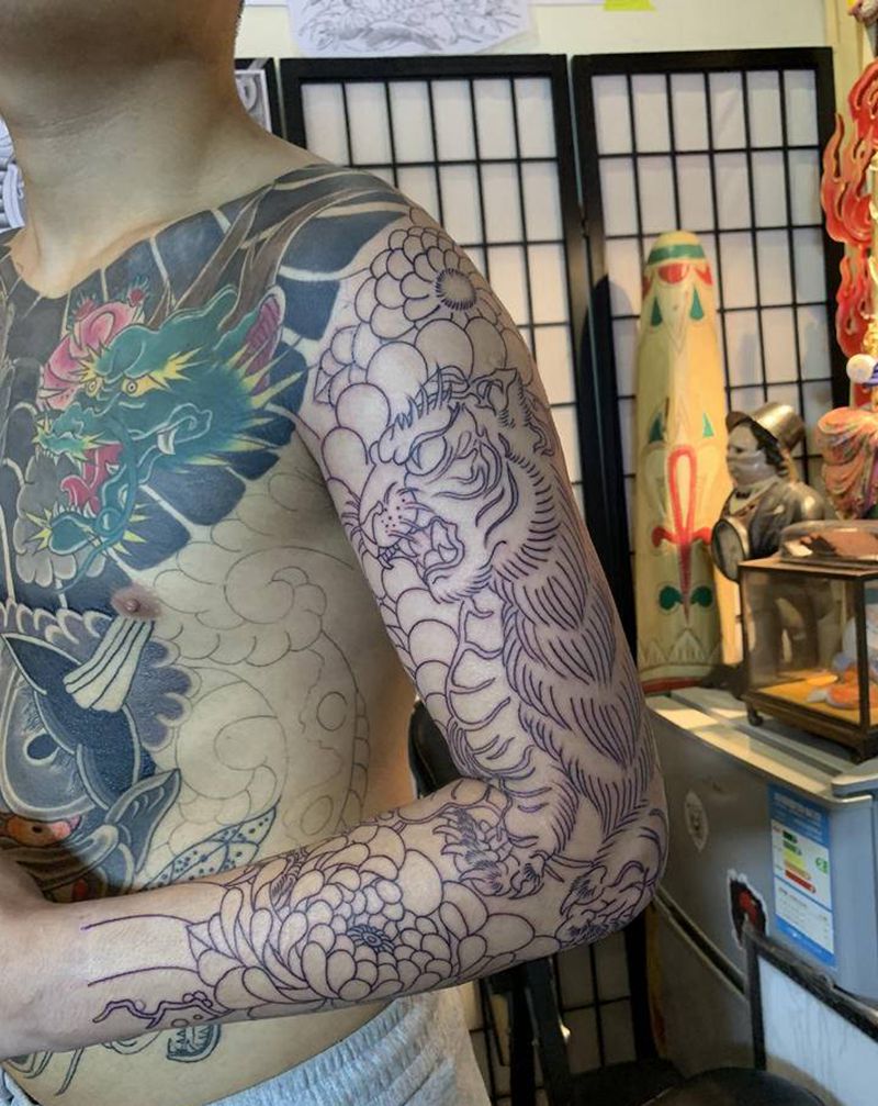 花臂纹身图片_手臂老传统纹身图案