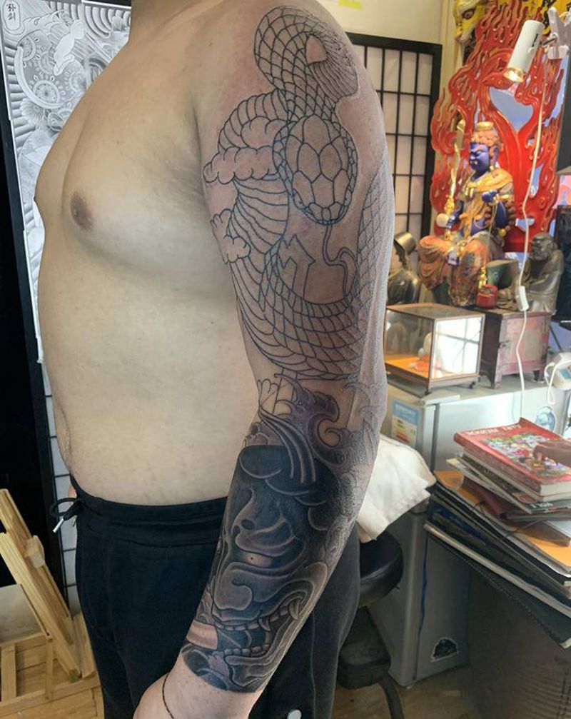 花臂纹身图片_手臂老传统纹身图案