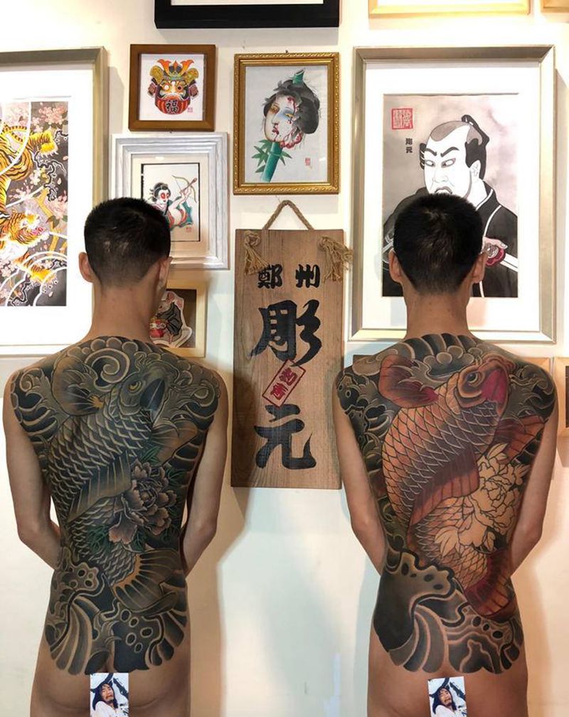 鱼纹身图片_背部老传统纹身图案