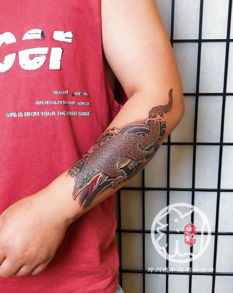 彫元作品纹身图片_手臂老传统纹身图案