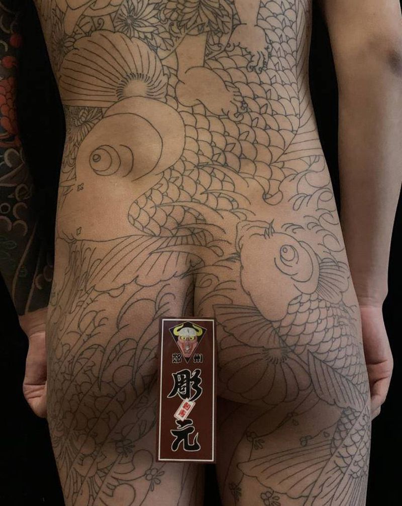 桶体未完纹身图片_手臂背部老传统纹身图案