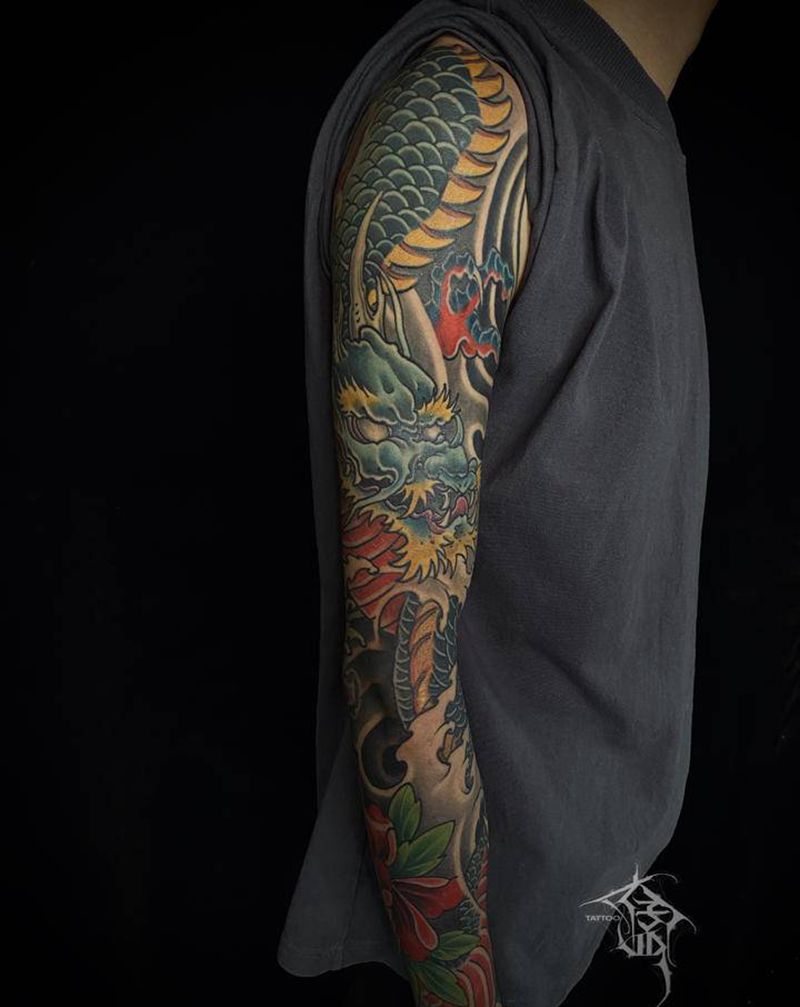 彩色龙花臂纹身图片_手臂新传统纹身图案
