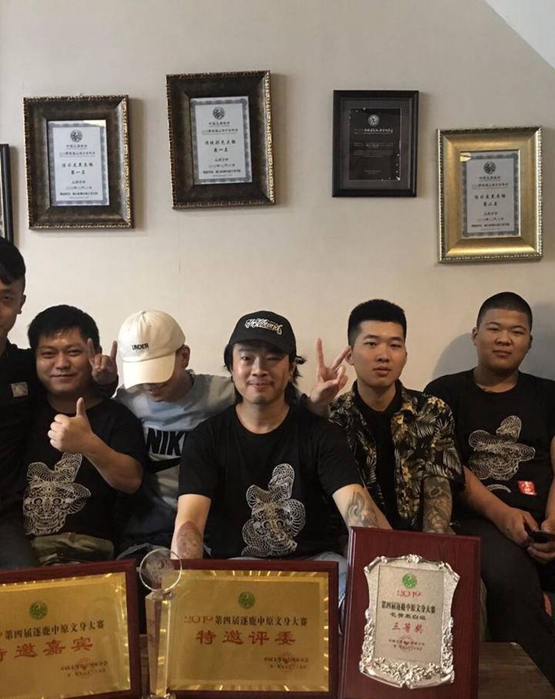 郑州纹身展纹身图片_背部腿部新传统纹身图案