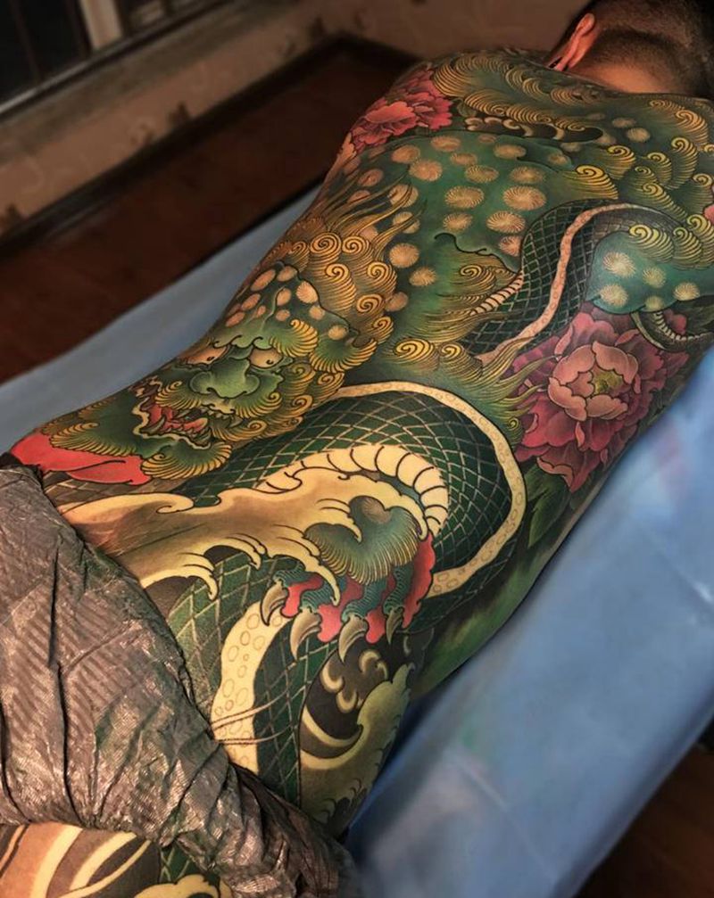 唐狮纹身图片_背部臀部新传统纹身图案