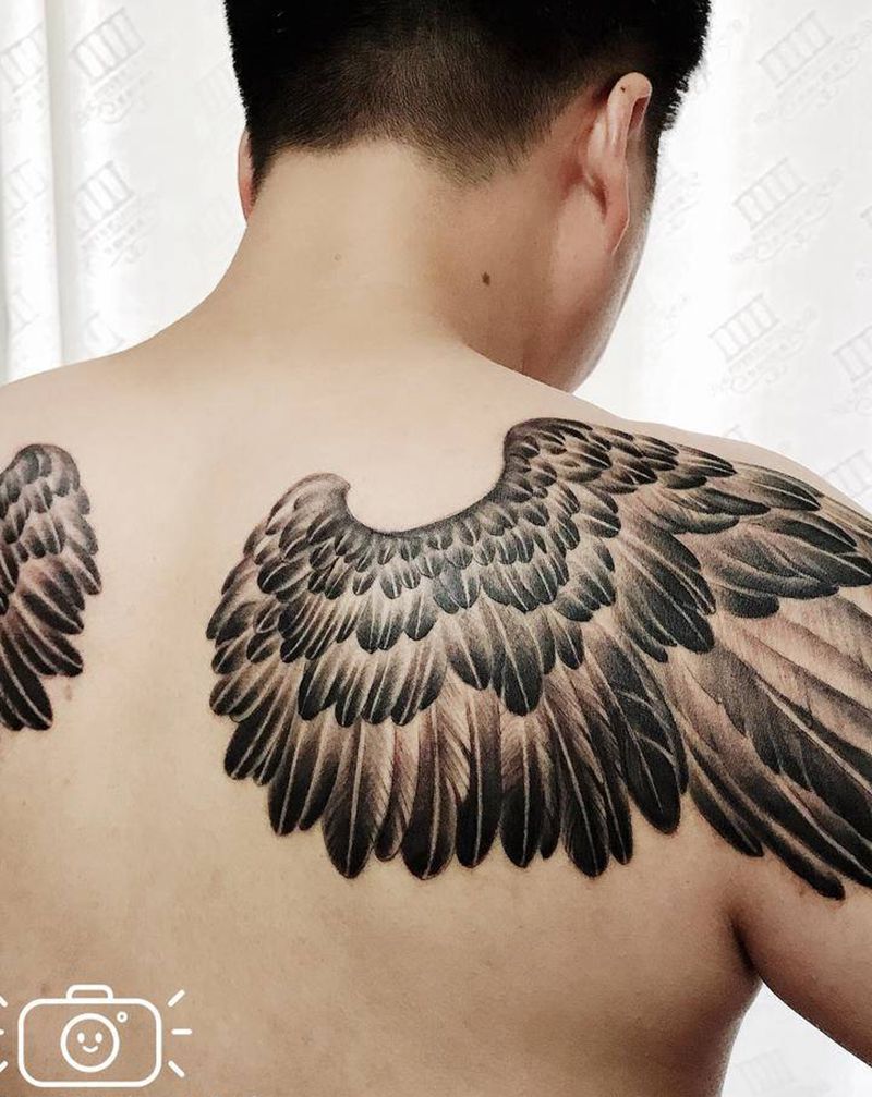 后背翅膀纹身图片_背部肩部新传统欧美写实翅膀翅膀后背翅膀纹身图案