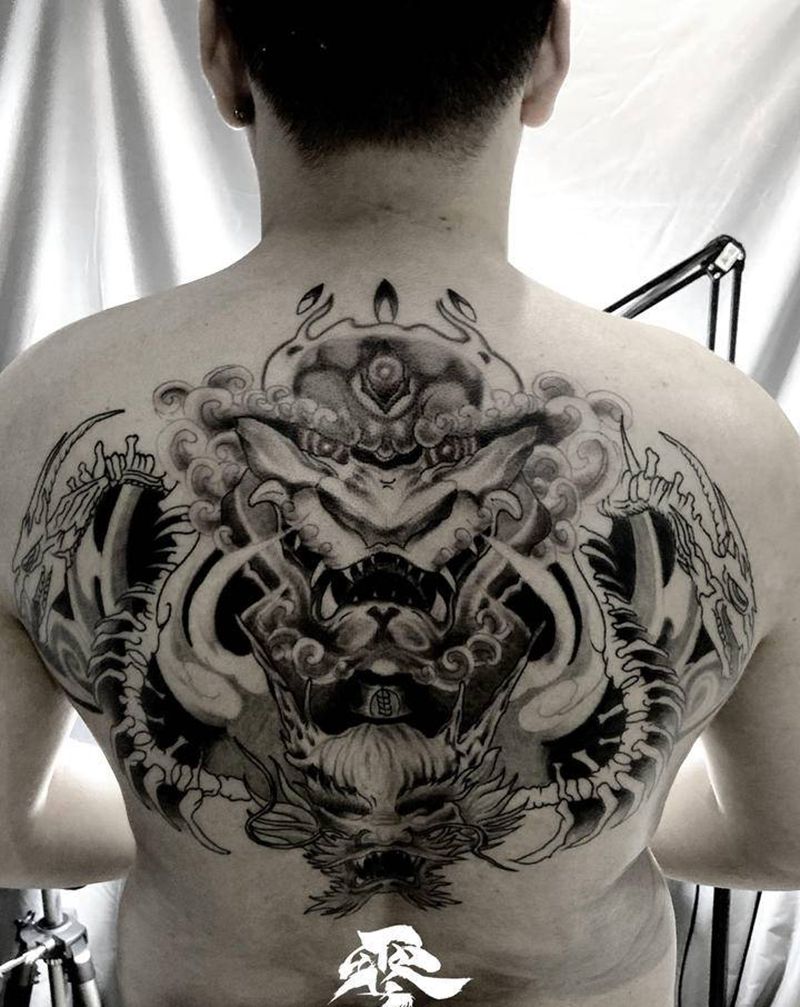 唐狮与龙纹身图片_背部纹身图案